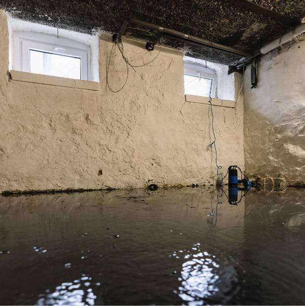Flooded basement with contaminated standing water that needs biohazard cleanup